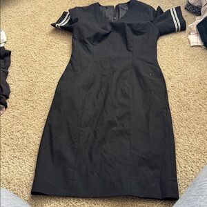 Elegant Black Dress with Striped Sleeves